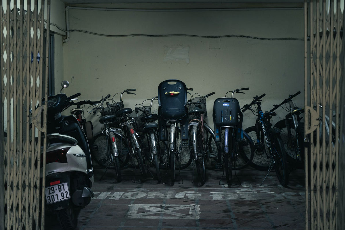 A collection of bicycles parked indoors in Vietnam, highlighting urban transport solutions.